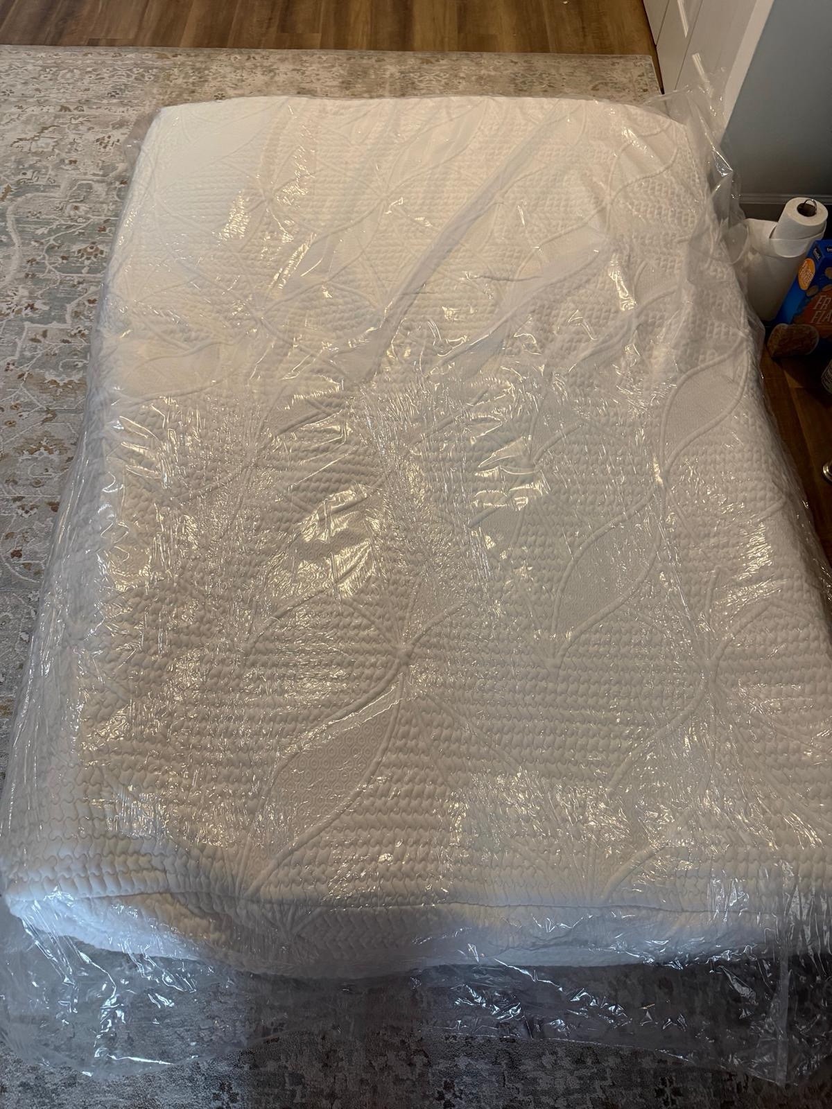 White Leaf Pattern Mattress in Protective Plastic Wrap for Bedroom