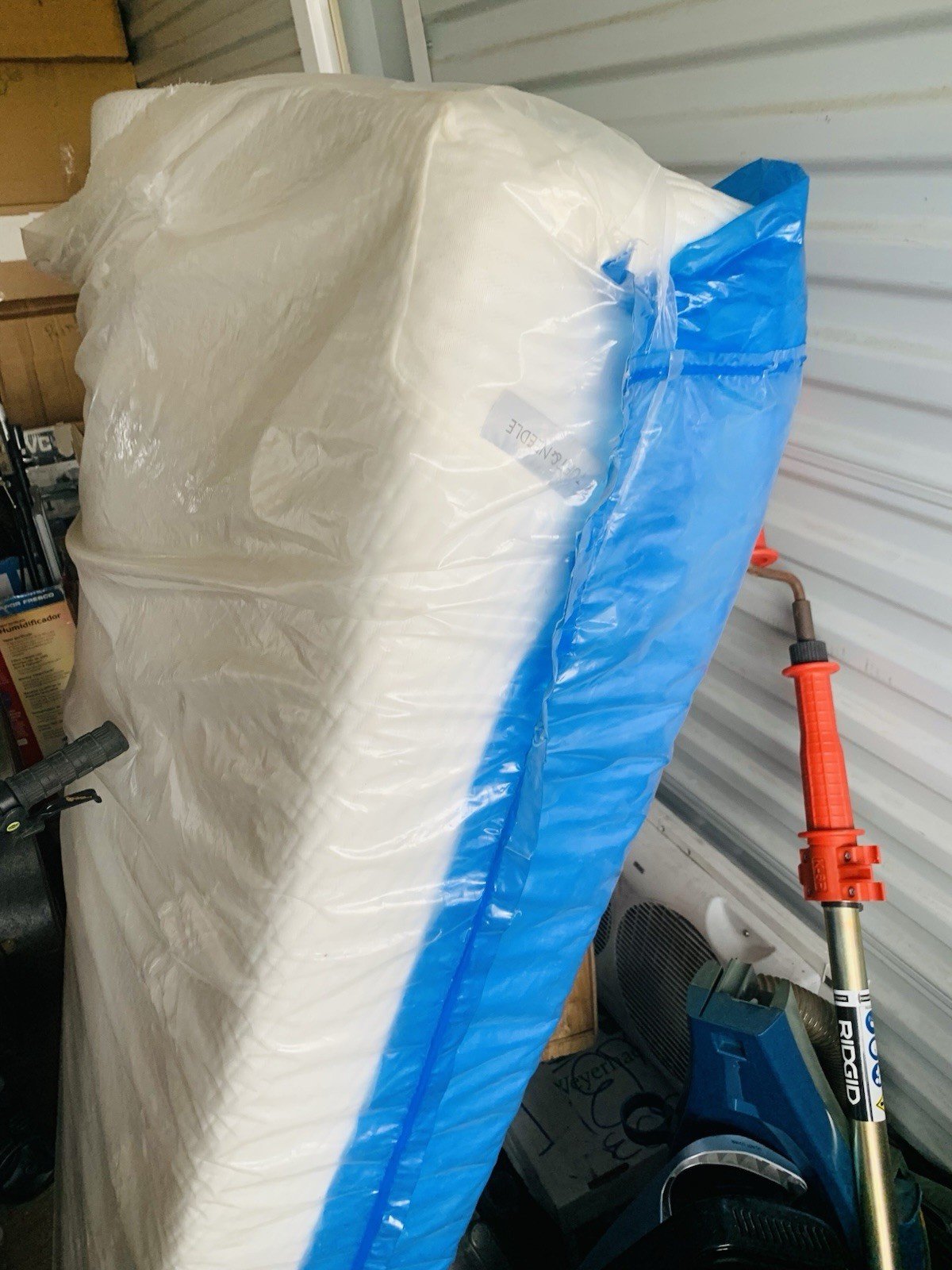 Tuft And Needle Queen Mattress In It’s Protective Wrapping